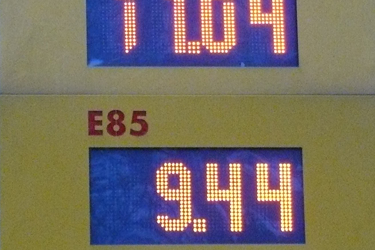 Gas station sign showing E85 costs 9.44 per gallon.