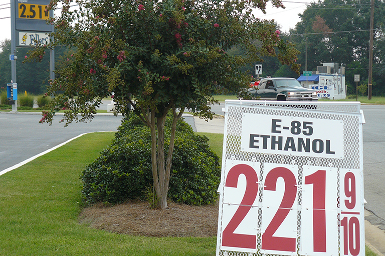 Sign reading “E-85 Ethanol $2.21.”