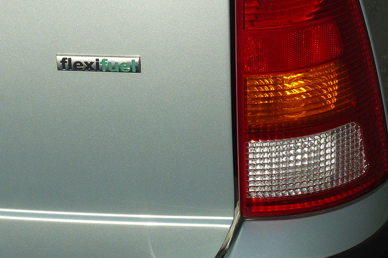 Label on the back of a vehicle reading “flexifuel.”