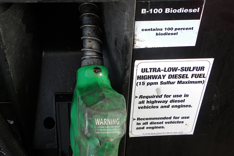 Gasoline pump with label reading “B-100 Biodiesel, contains 100 percent biodiesel.”