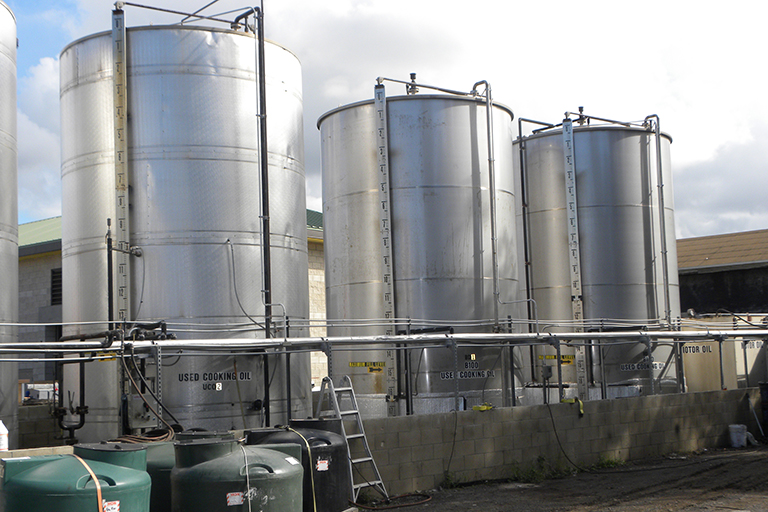 Three silos of used cooking oil.