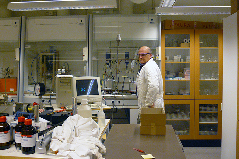 Art Ragauskas looks at the camera from across the laboratory.